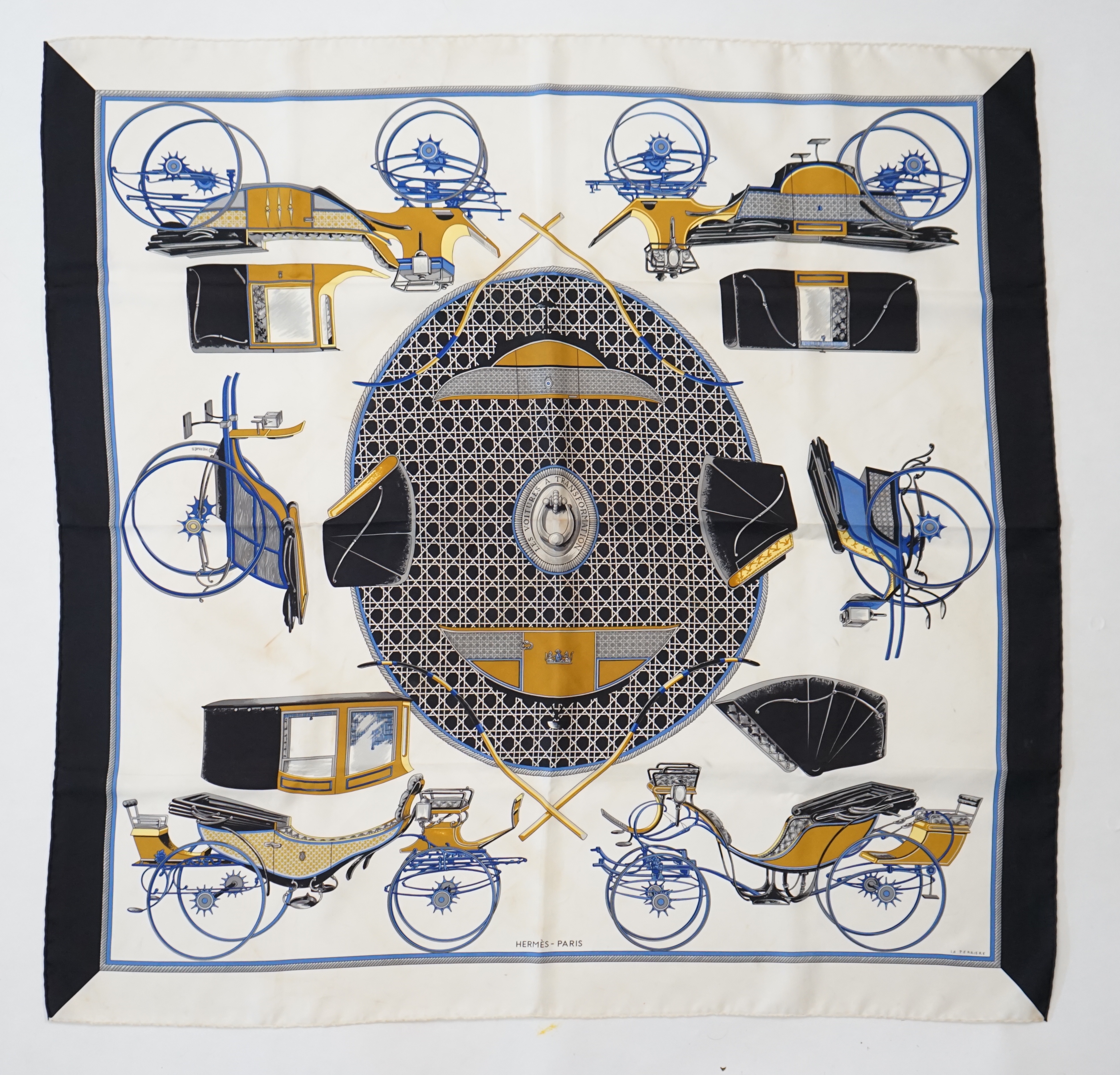 A Hermès Les Voitures a Transformation by Francoise de la Perriere black and white silk scarf, approx 90cm x 90cm